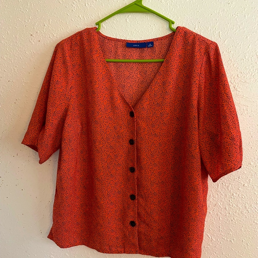 Pink polka dotted blouse